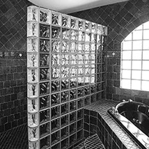 Bathroom stone tile work and glass block creations