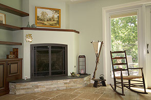 Stone fireplace and floor tiling design and installation