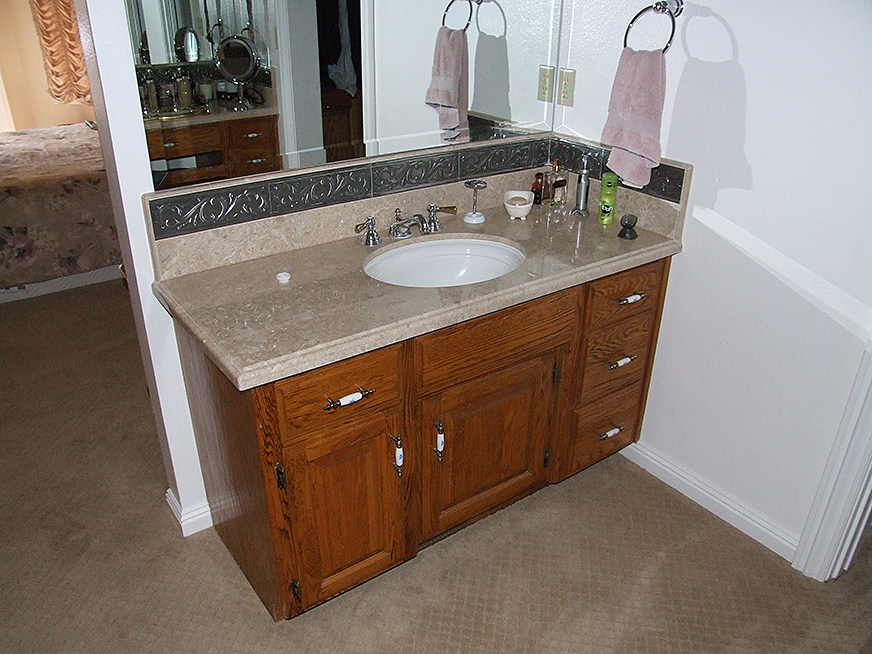 Granite bathroom countertop and backsplash.