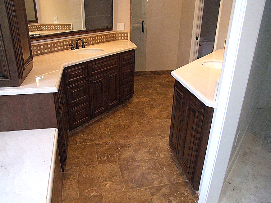 Engineered stone countertops, stone tile flooring installation.