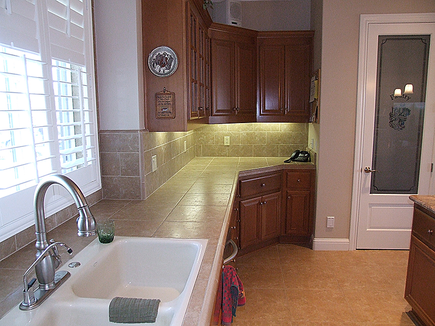Stone tile countertops and flooring. Granite countertops.