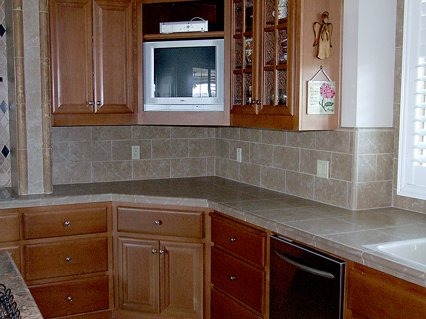 Stone countertop and backsplash.