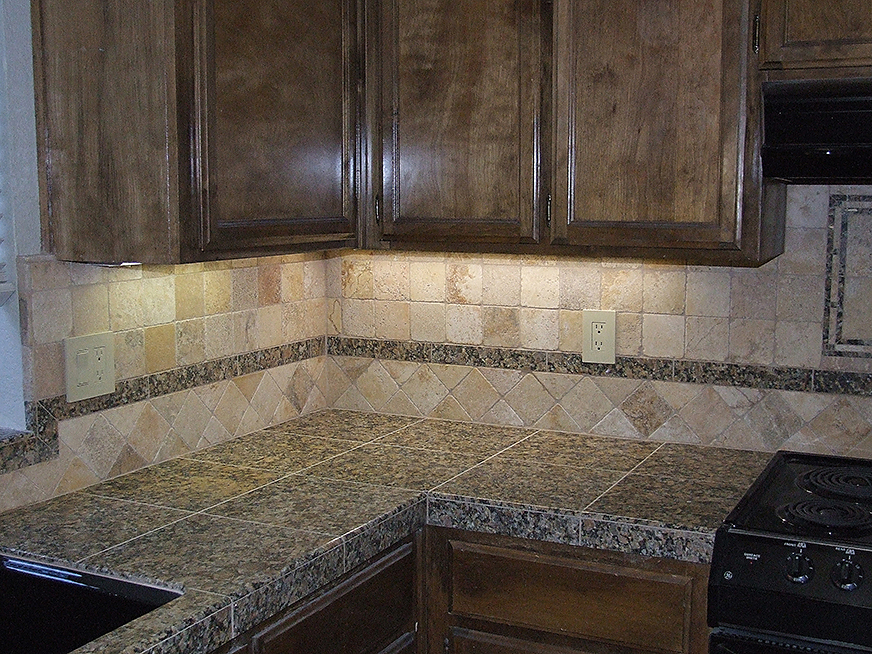 Granite tile countertop and backsplash.